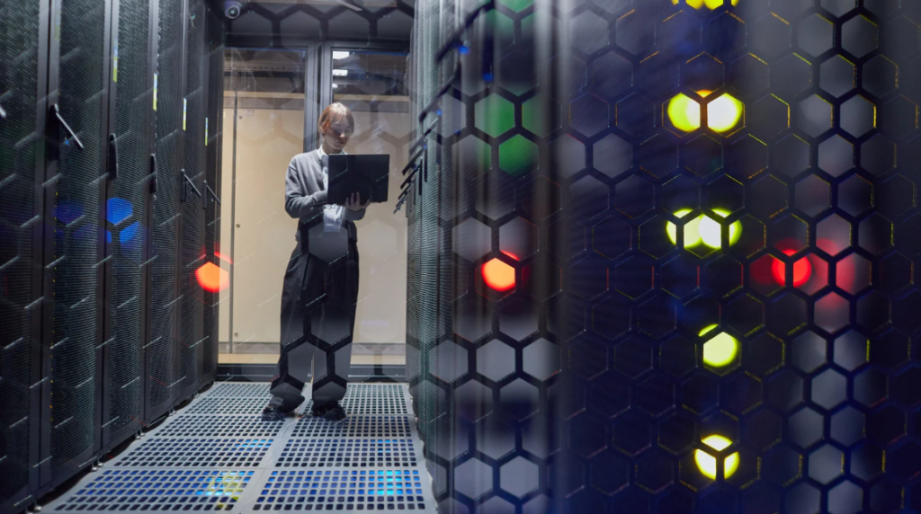  woman with checklist doing data center maintenance